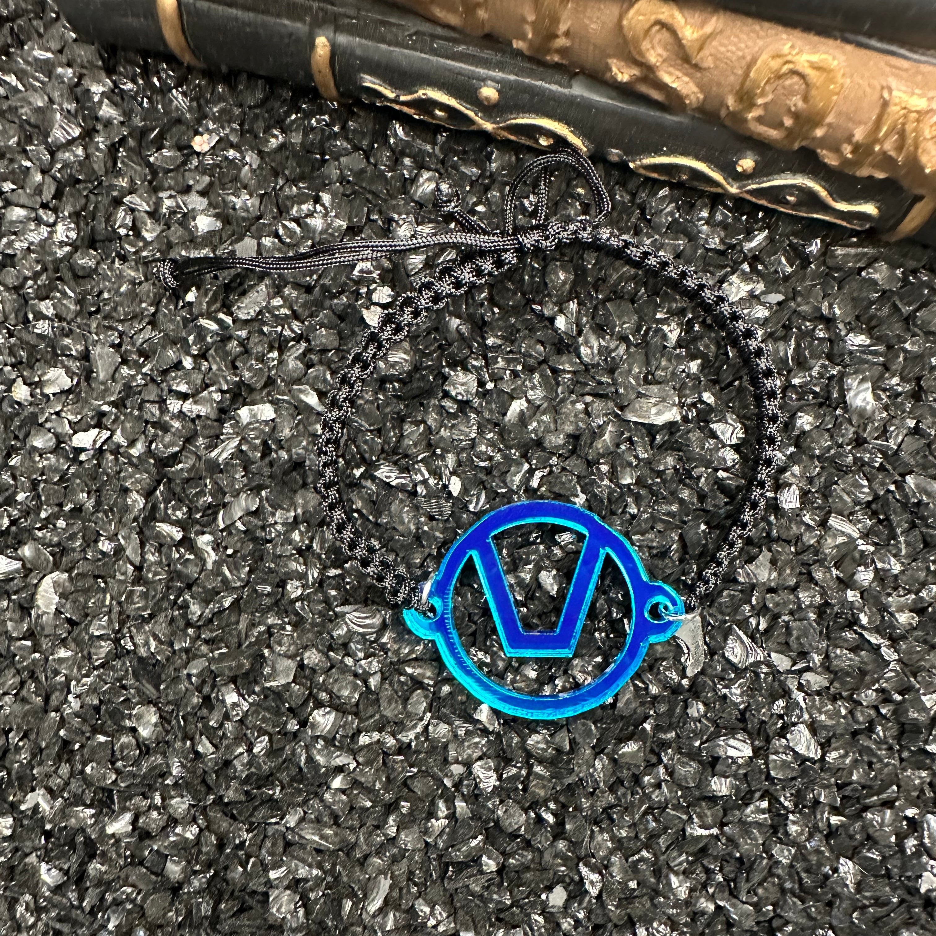 Swinger Symbol Lapis Acrylic Bracelet on Adjustable Black Cord