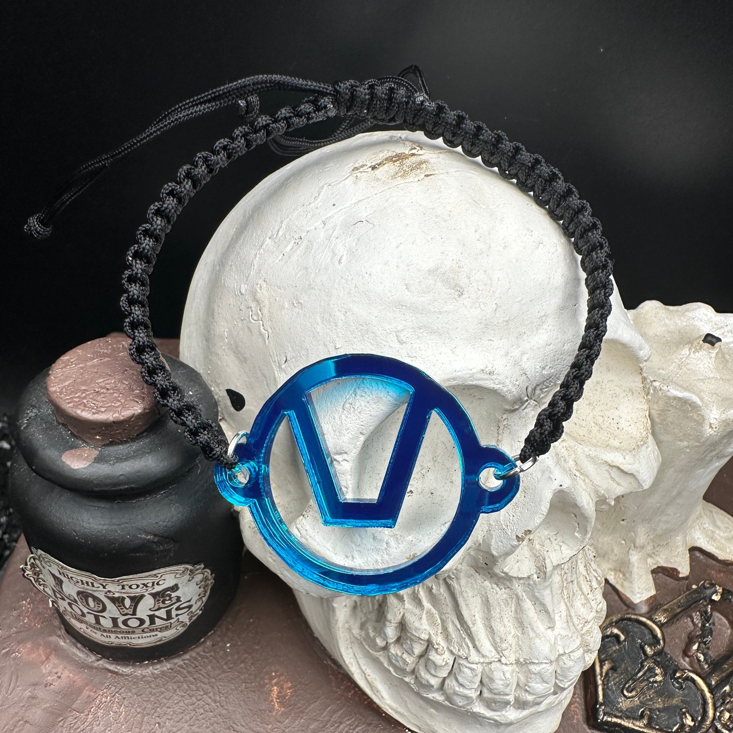 Swinger Symbol Lapis Acrylic Bracelet on Adjustable Black Cord