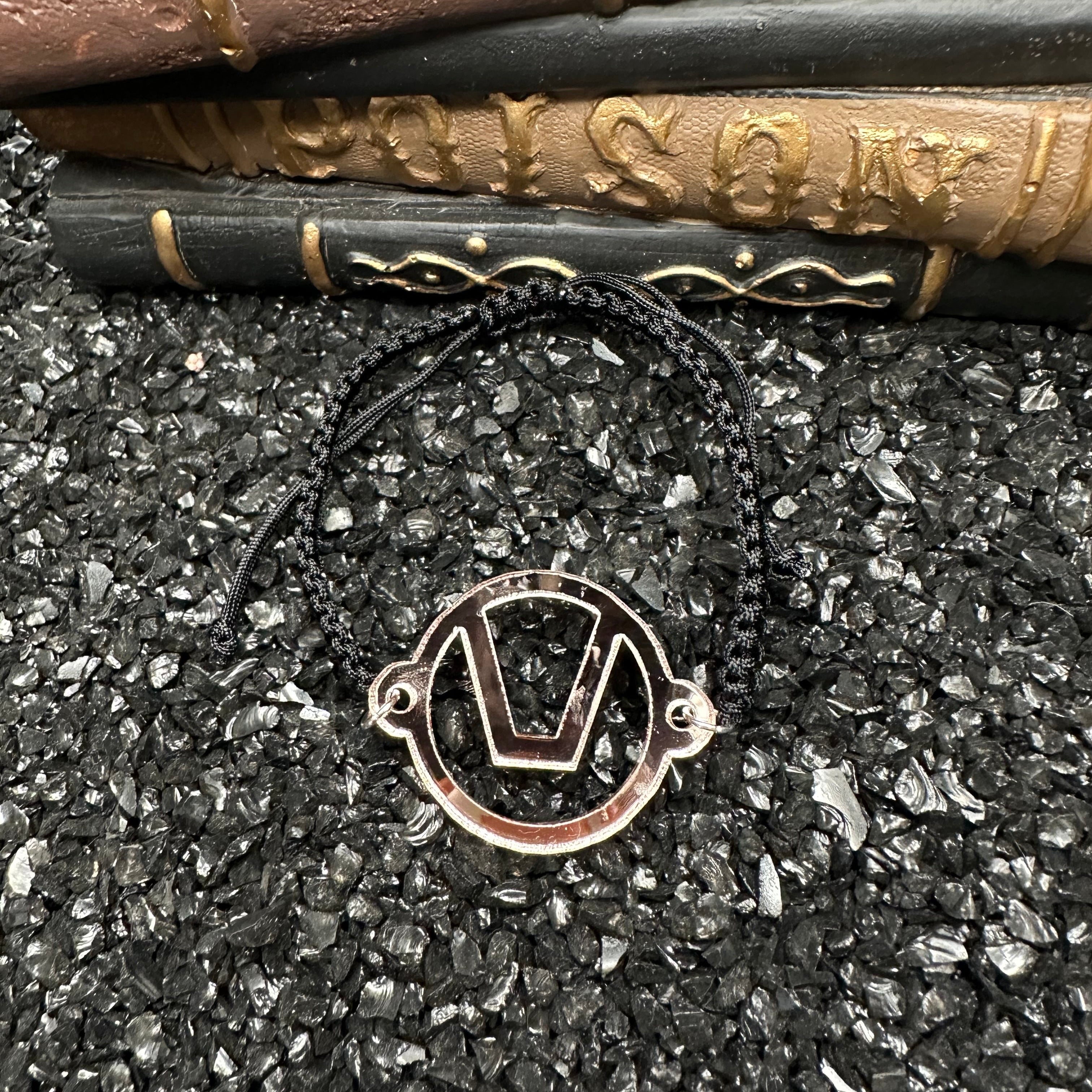 Swinger Symbol Rose Gold Acrylic Bracelet on Adjustable Black Cord