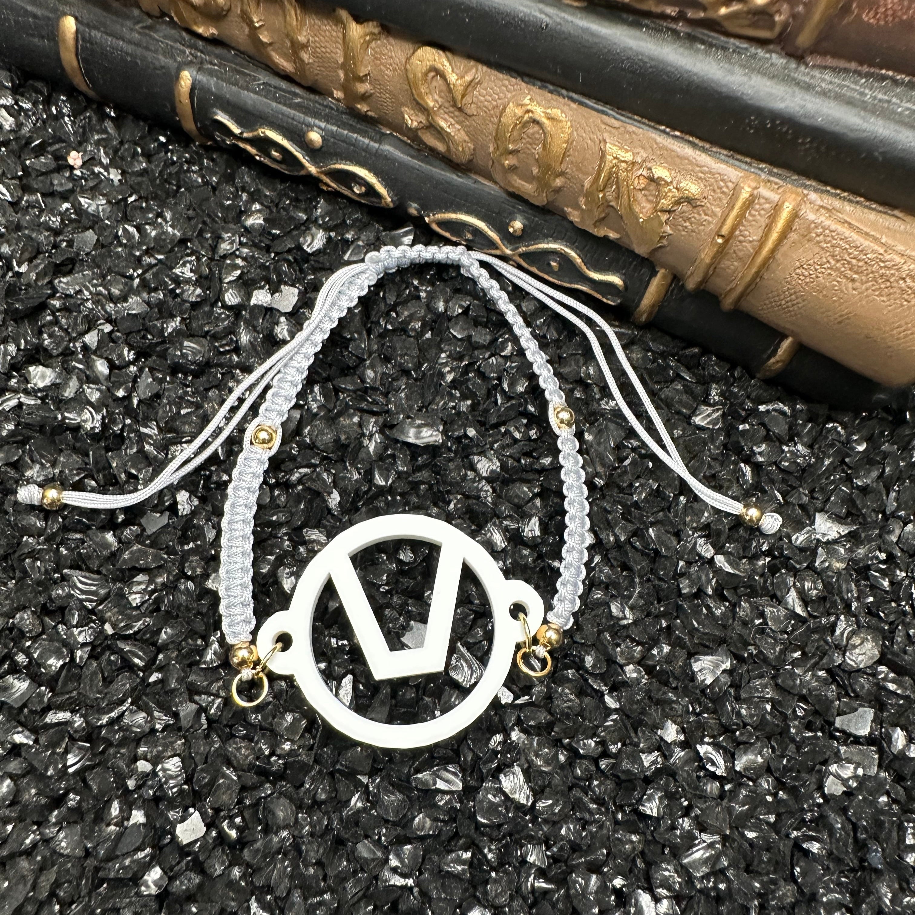 Swinger Symbol White Acrylic Bracelet on Adjustable Grey Cord