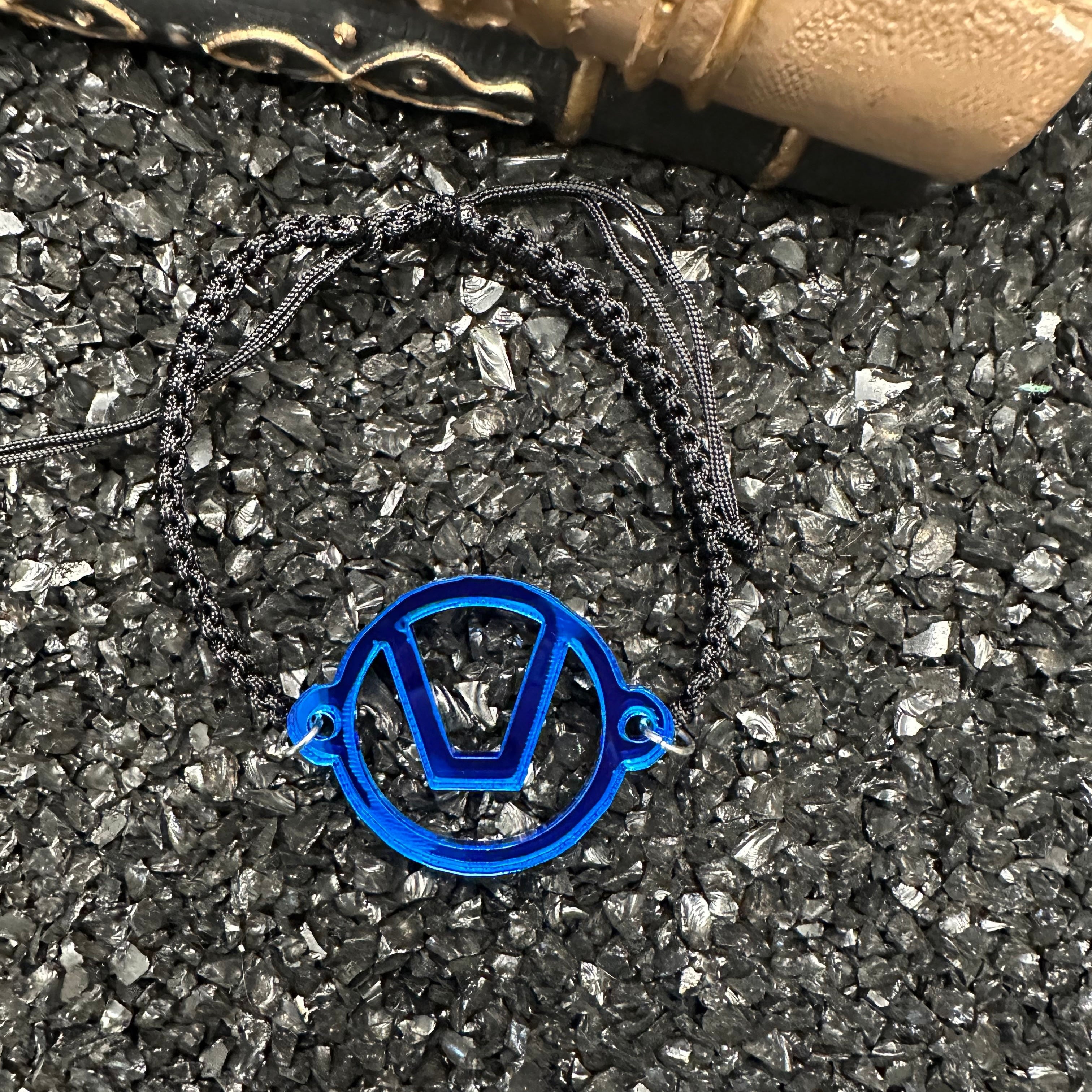 Swinger Symbol Blue Acrylic Bracelet on Adjustable Black Cord