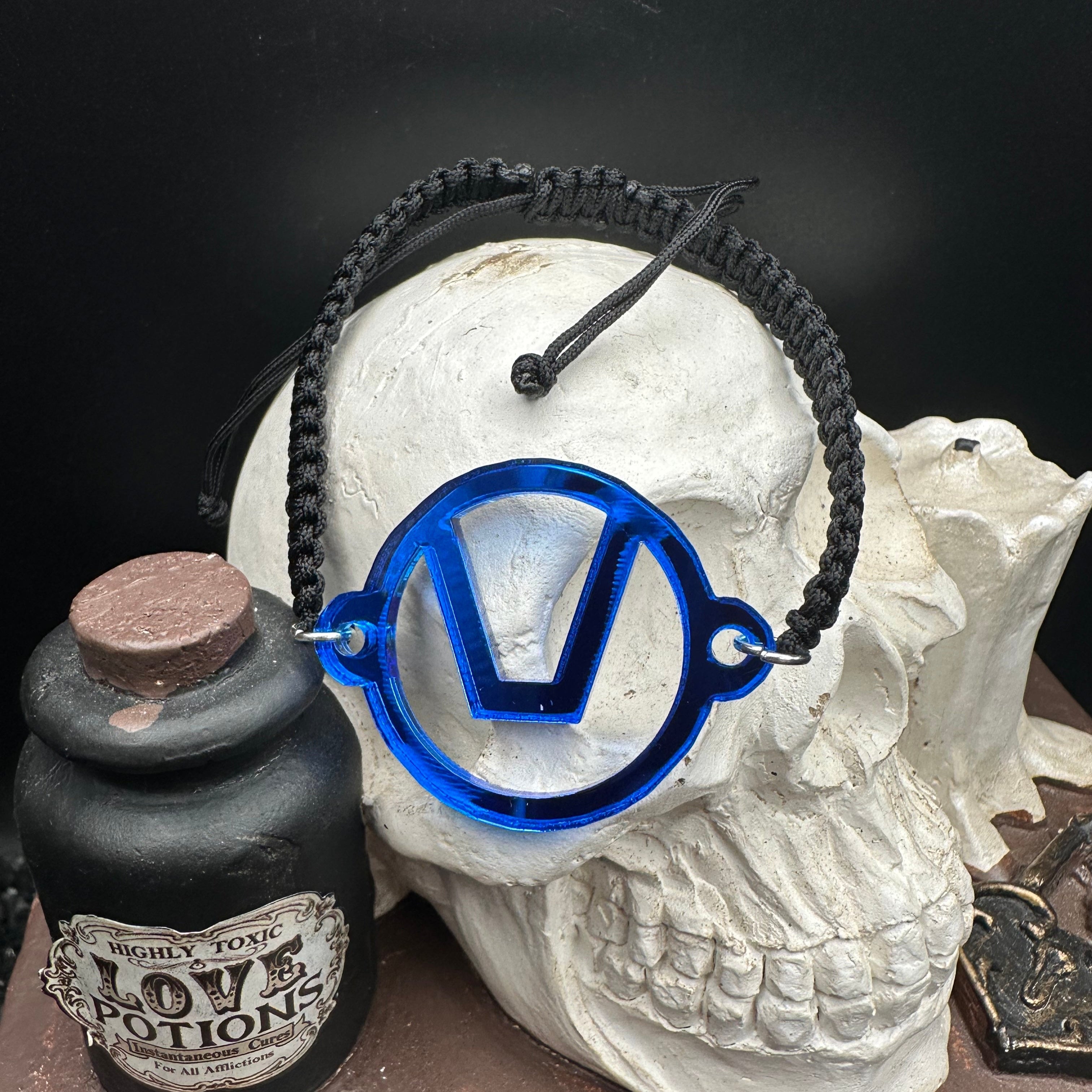 Swinger Symbol Blue Acrylic Bracelet on Adjustable Black Cord