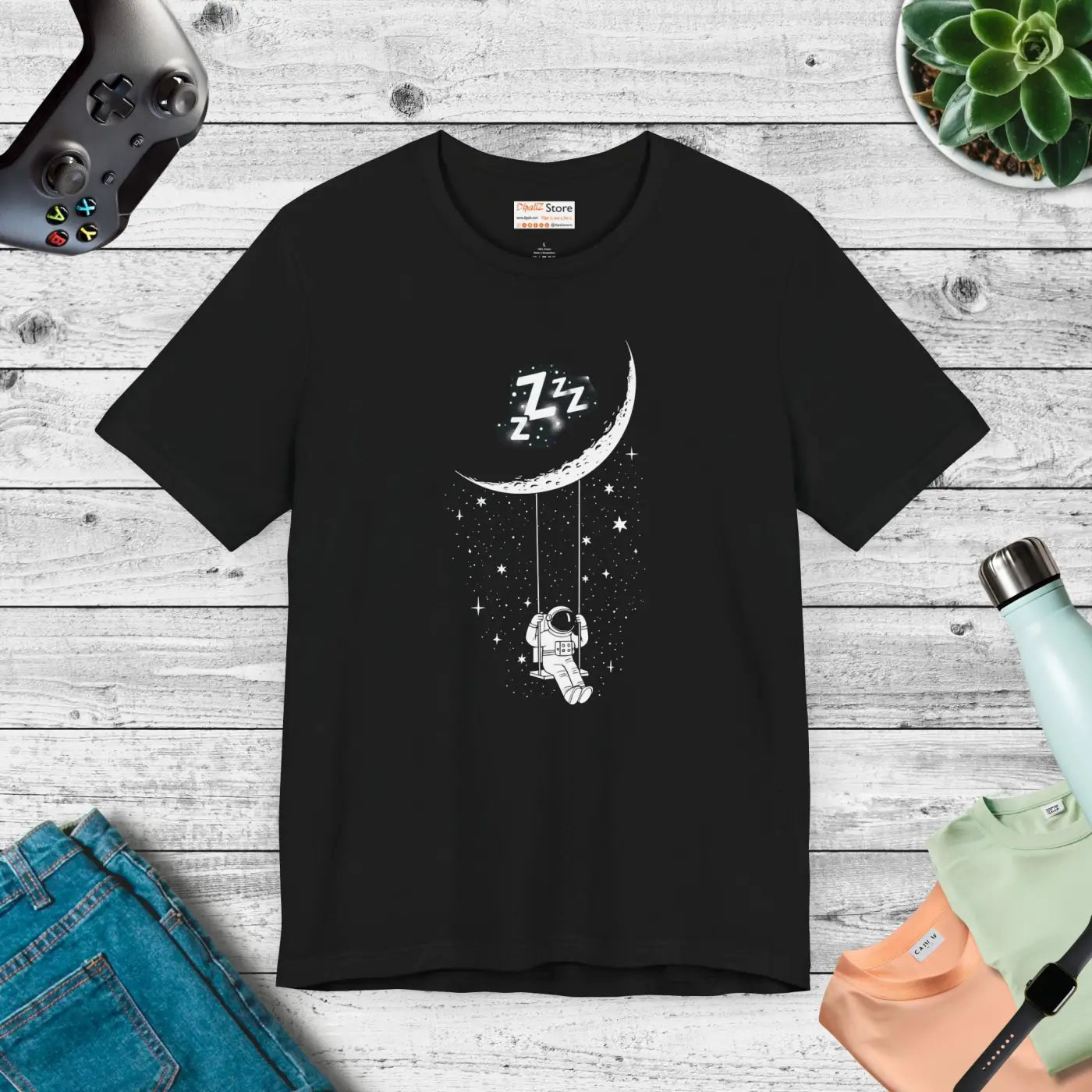 Astronaut Moon Swing T-Shirt - Cosmic Crescent Design - DipaliZ