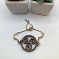 Wood Triskelion on Adjustable Yellow Link Chain Bracelet